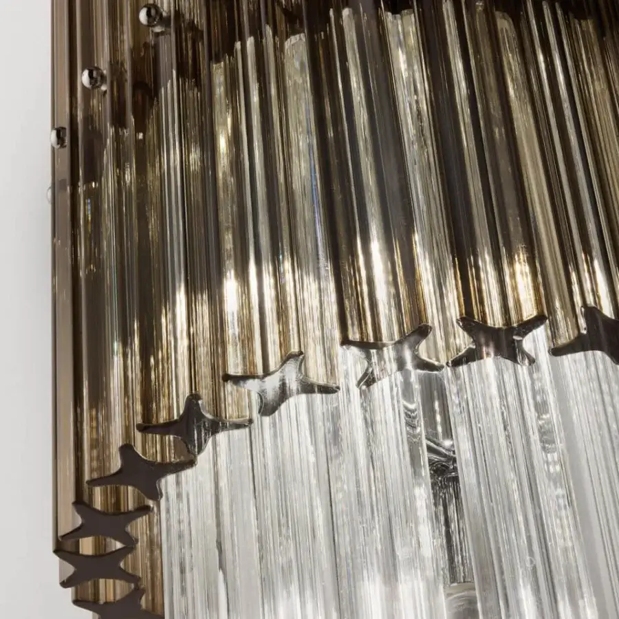 Exclusive Italamp Carmen wall lamp with a chrome metal structure and dense arrangement of transparent quadrihedra glass rods
