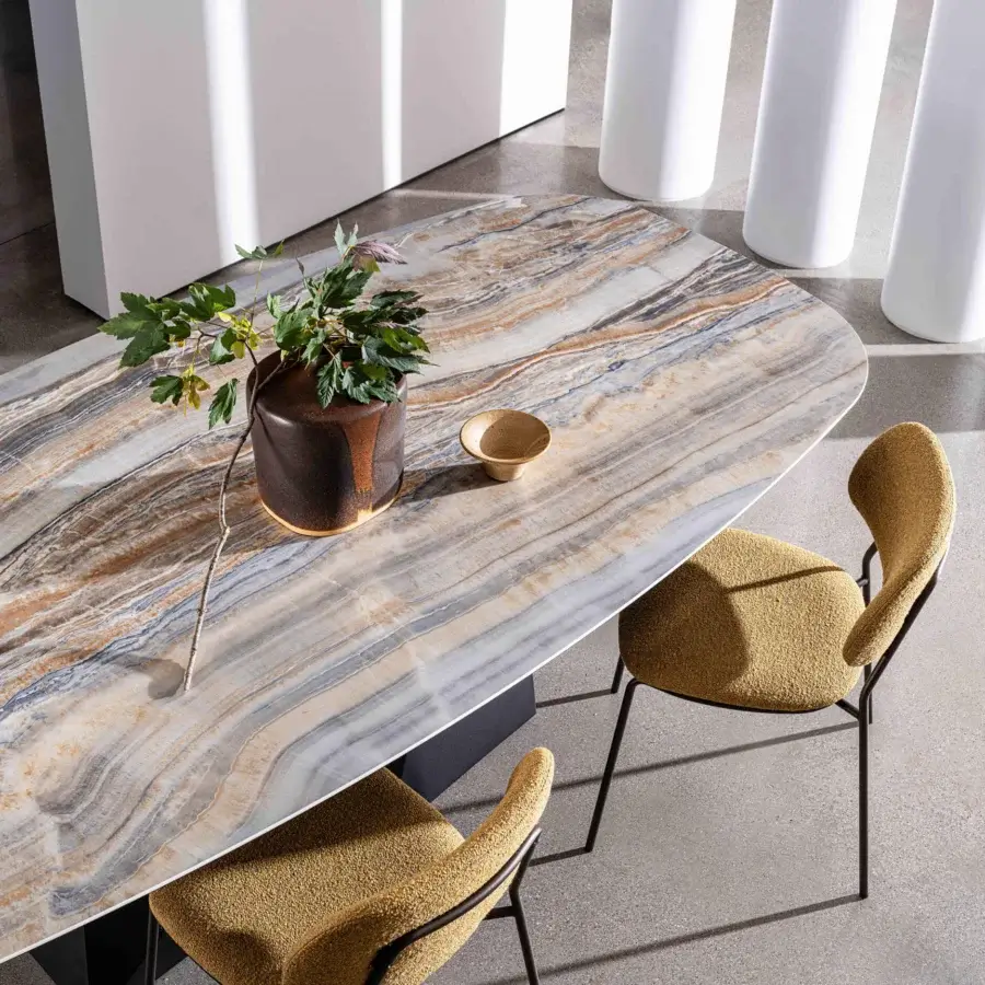 Distinguished Sovet Italia GranDeod table with swirling ceramic laminate and dark lacquered metal base