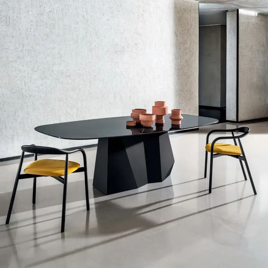 Sophisticated Sovet Italia GranDeod table with laminated ceramic top and lacquered sculptural metal base in dark tones