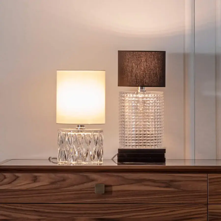 Distinguished Italamp Zoe lamp with chrome metal and transparent glass, crafted in a cylindrical design with a dark lampshade