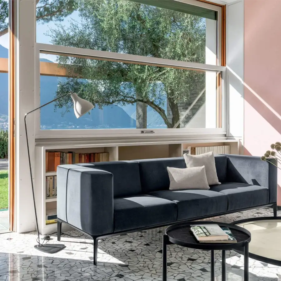 Elegant Sovet Italia Slim sofa with dark blue textile upholstery and polished chrome die-cast aluminum legs