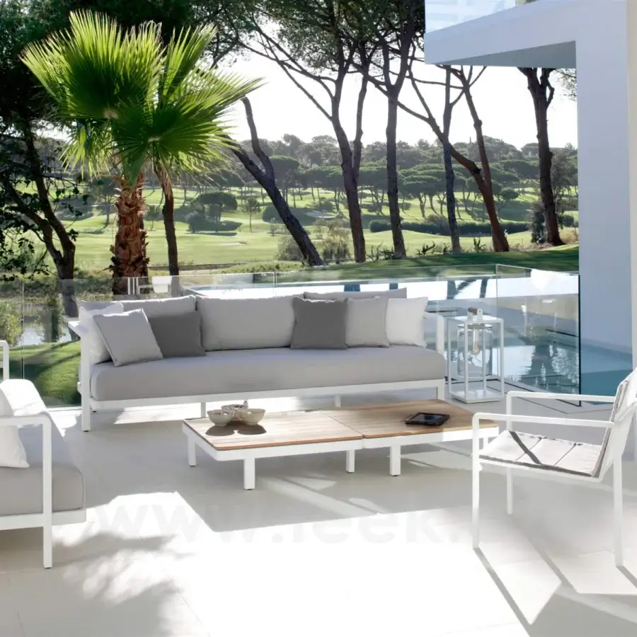 Elegant Royal Botania Alura lounge sofa with white aluminum frame and light gray textile cushions