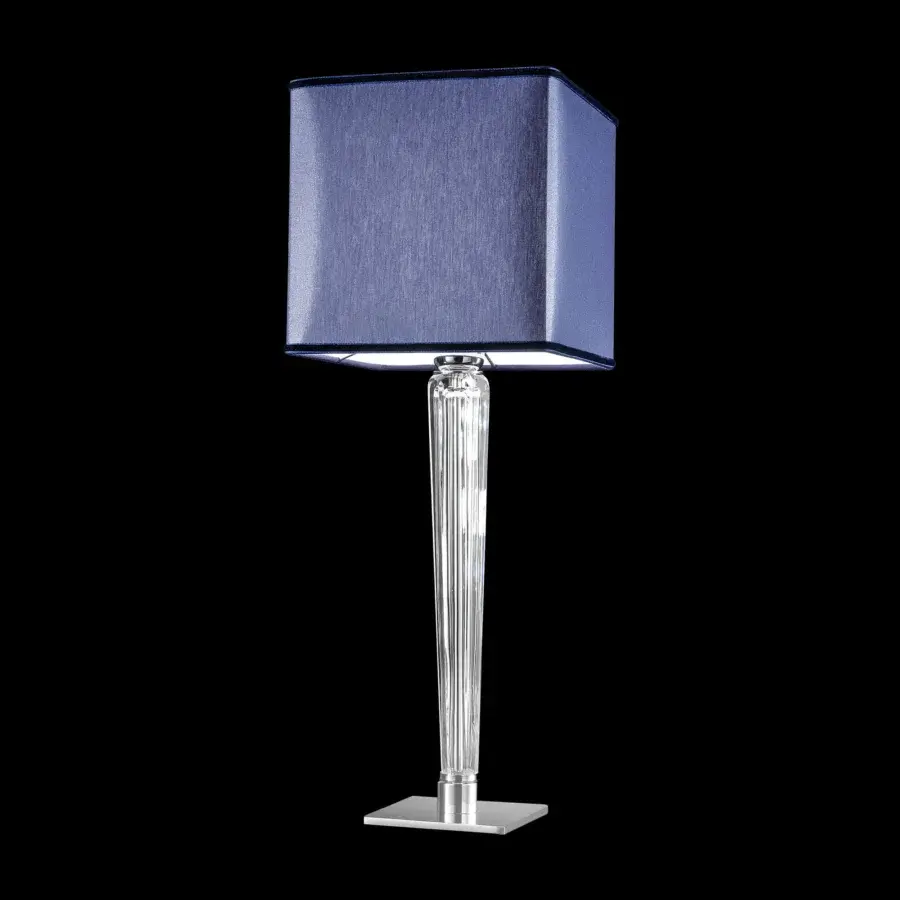Superior Italamp Spillo table lamp with hand-carved transparent crystal body and polished metal base in dark blue textile