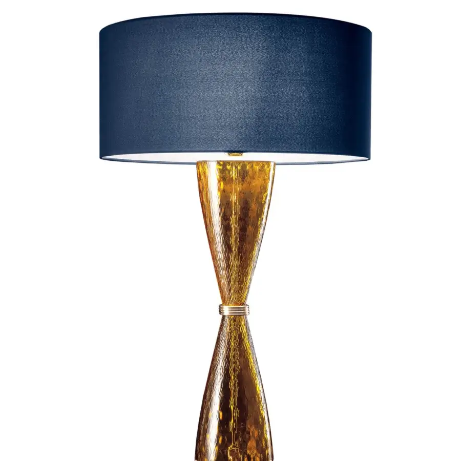 Distinguished Italamp Cheers table lamp with hourglass glass body and dark blue textile lampshade in gold-toned textured finish with chrome metal accents