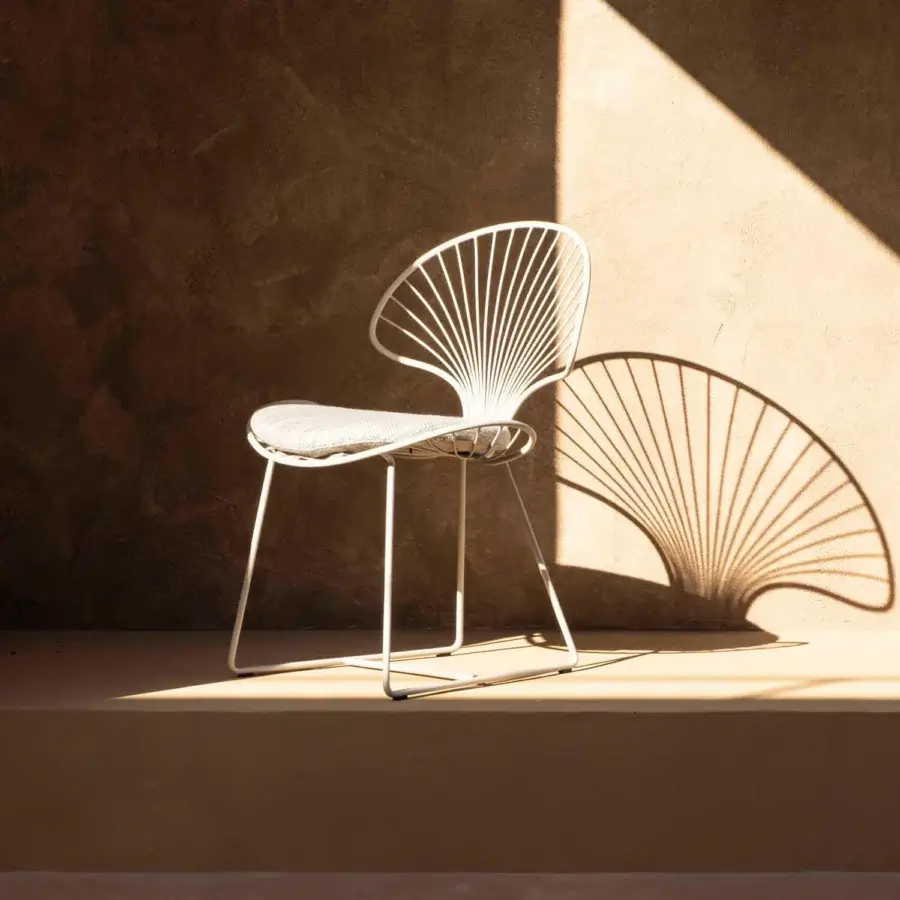 Superior Royal Botania Ostrea lounge chair crafted in coated stainless steel with a smooth white finish and textile cushion