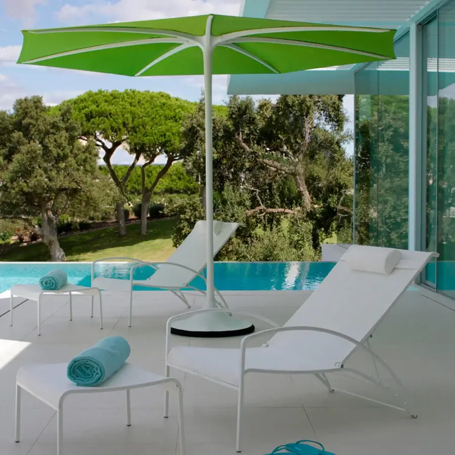 Sophisticated Royal Botania QT Lounger chair with white Batyline seat in brushed electro polished stainless steel