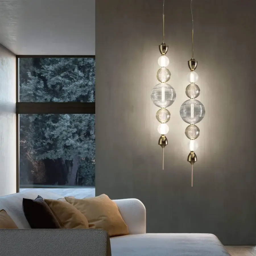Exceptional Italamp Greta suspension lamp with hand-cut crystal diffusers in white, clear, and tinted glass with light gold finish
