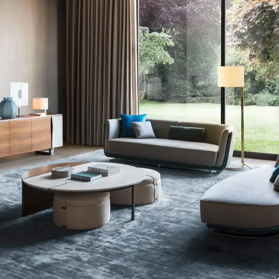 Distinguished OAK Central coffee table with circular marble and walnut wood tabletop supported by light beige fluid leather ottomans in matte finish