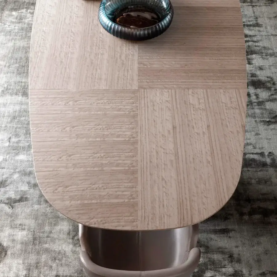 Distinguished OAK Nota armchair with rounded silhouette, smooth gray leather upholstery and painted white ash wood base