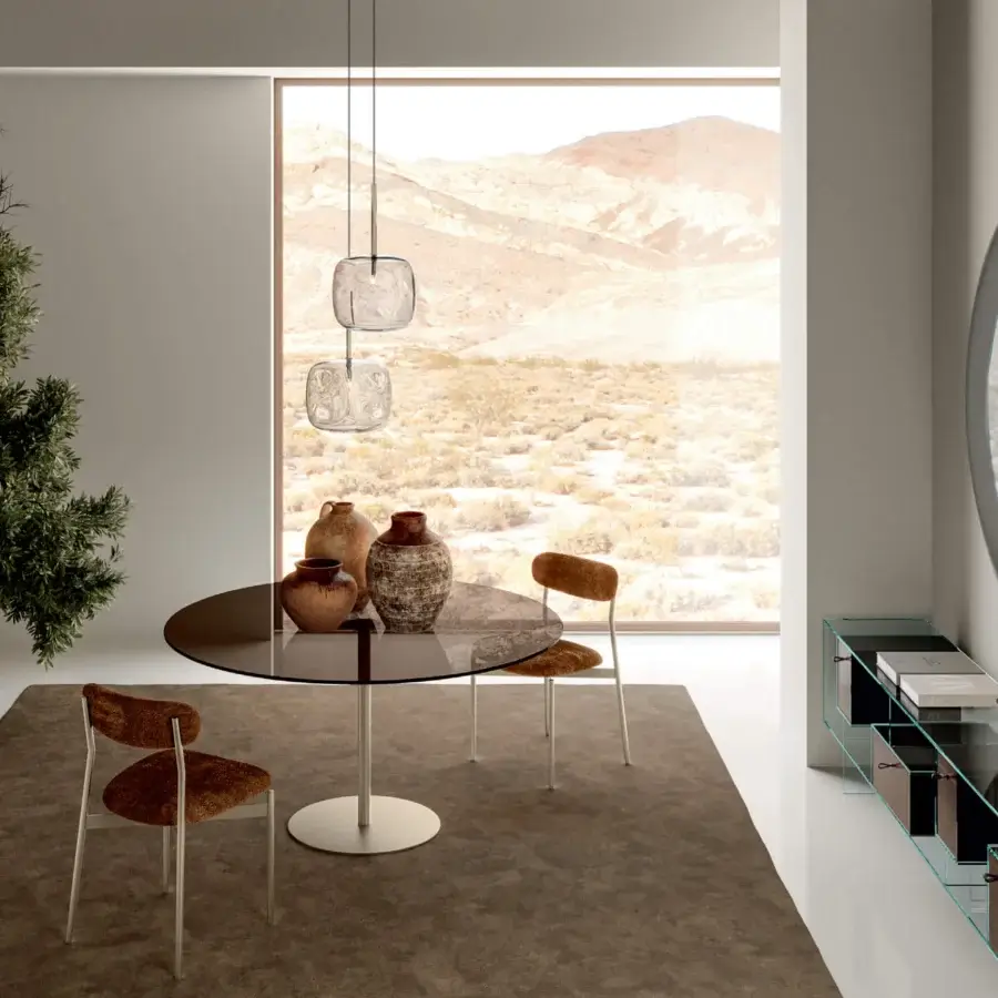 Distinguished Tonelli Design Farniente table with sleek glass top and minimalist metal base in a tinted matte finish