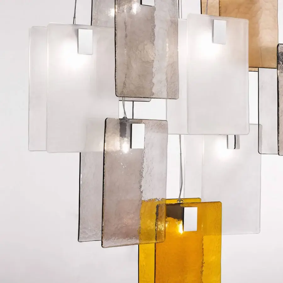 Distinguished Italamp Mura suspension lamp with layered cast glass panels in white, grey, and amber with sleek chrome metal details