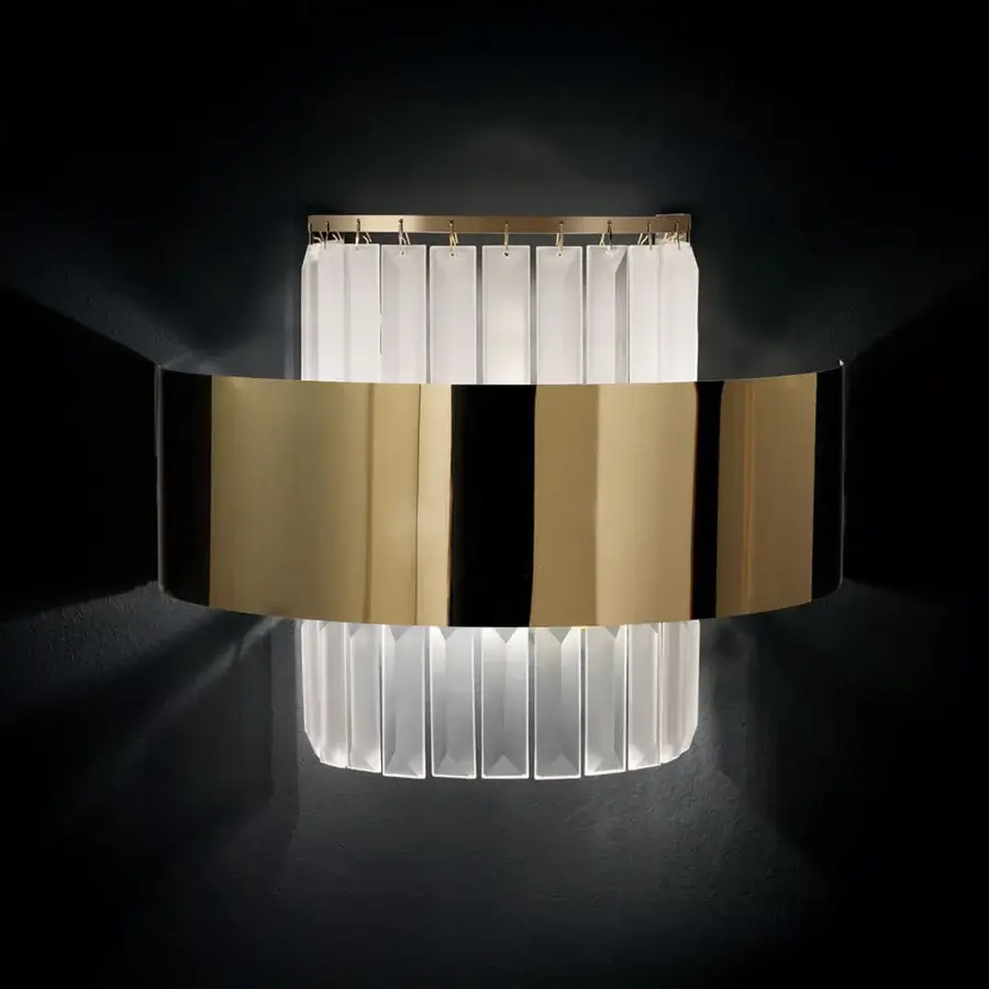 Sophisticated Italamp Crono wall lamp with a dual-tiered cylindrical structure and gold finished metal complemented by etched crystal pendants