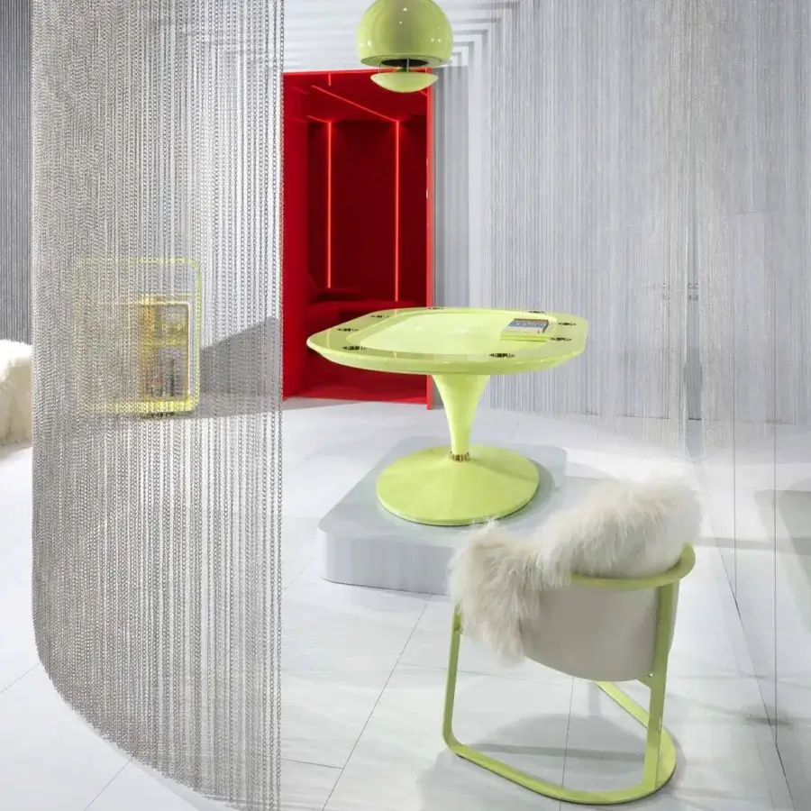 Lavish Vismara Dolly armchair with comfortably padded seat and backrest in natural Mongolia covering and pale green metal frame
