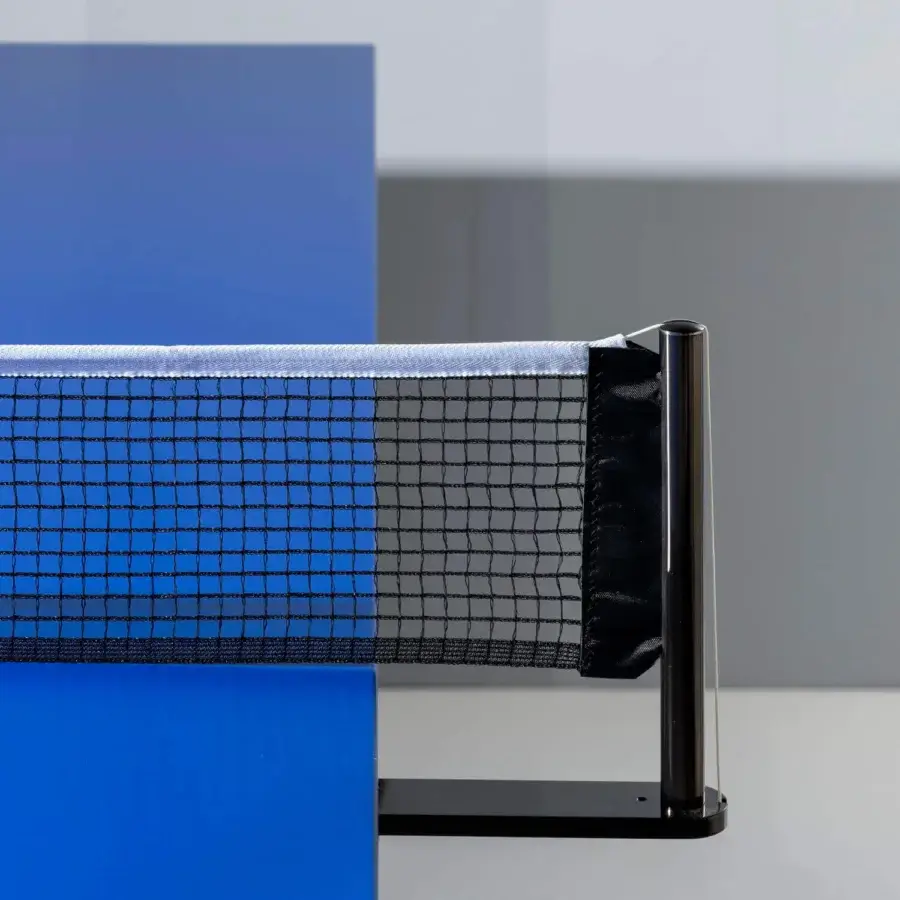 Distinguished Vismara Egeo table-tennis table with vibrant blue ceramic stone effect tabletop and concrete effect legs crafted in stainless steel