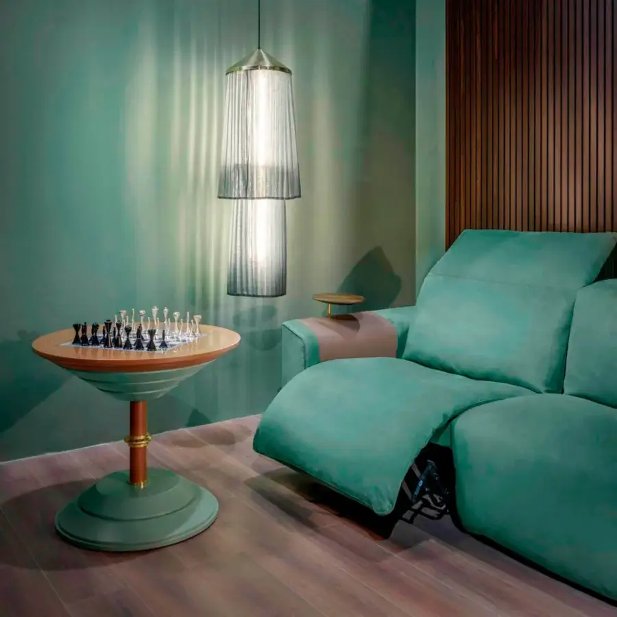 Sophisticated Vismara Kubrik sectional with matte textile upholstery in teal and pale pink, built with a double reclining mechanism