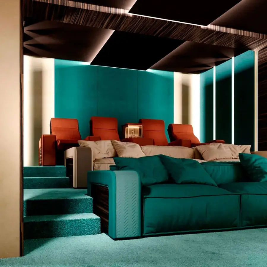 Superior Vismara Onassis Home Cinema sofa upholstered in vibrant teal fabric with quilted detailing and polished Ebony Makassar armrests