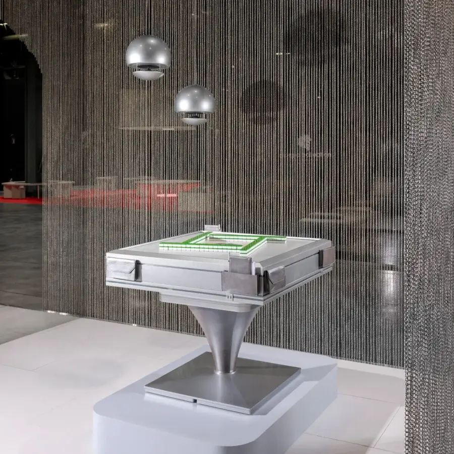 Distinguished Vismara Posh Mahjong table with green velvet playing surface and silver satin metal finish crafted for four players