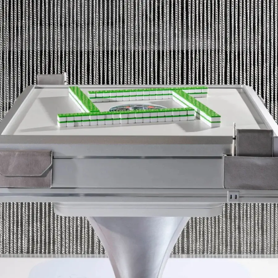 Innovative Vismara Posh Mahjong table crafted with glossy white synthetic material and green velvet playing surface with integrated storage