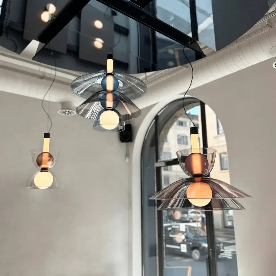 Lavish Penta Gems suspension lamp crafted in translucent shades with satin gold, blue and silver metallic details