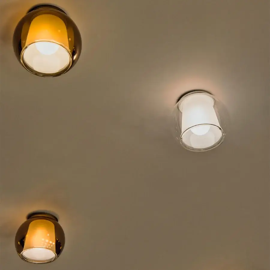 Superior Penta Glo ceiling lamp with translucent glass and warm amber tone crafted in Italy with a smooth finish