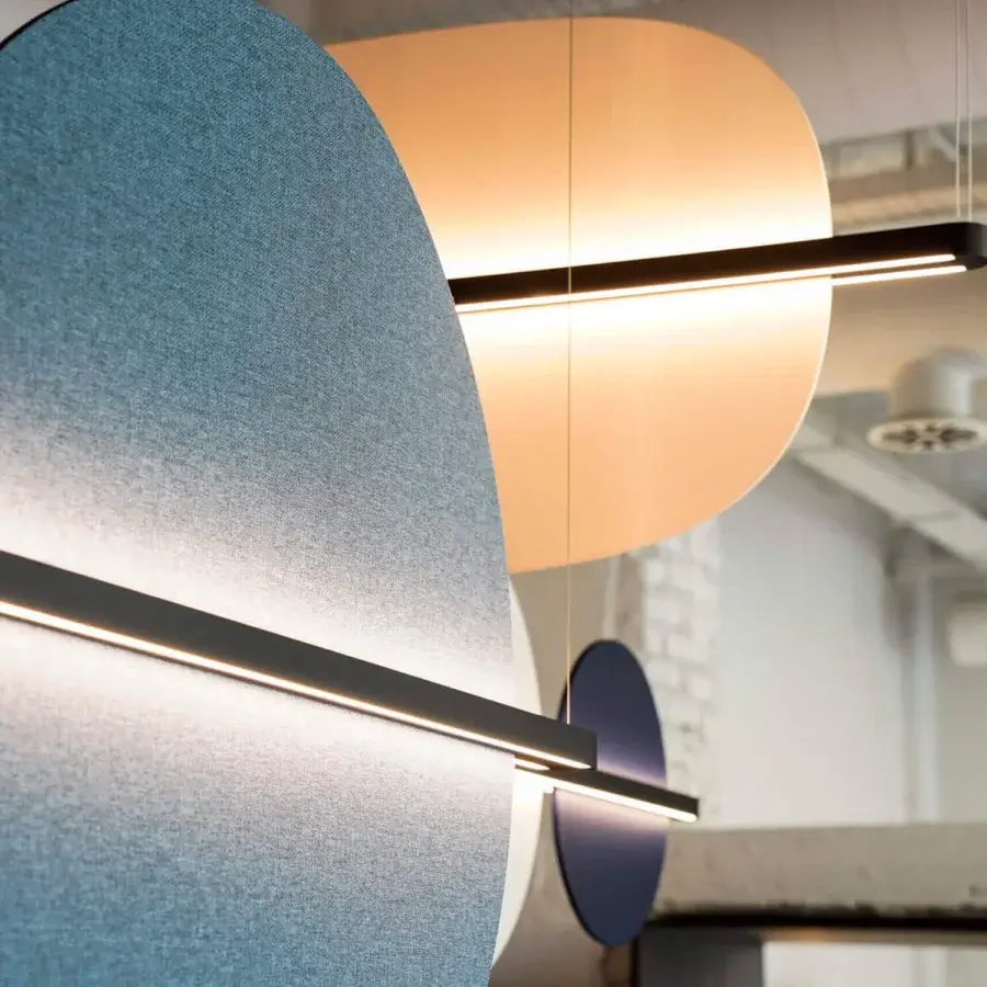 Elegant Penta Hang Out suspension lamp with a dark grey metal frame and integrated textile panels in blue-grey, beige, and navy hues