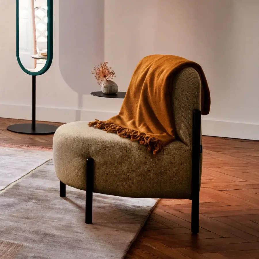 Elegant Bolzan Letti Flag lounge chair with warm beige textured textile and sleek dark metal frame