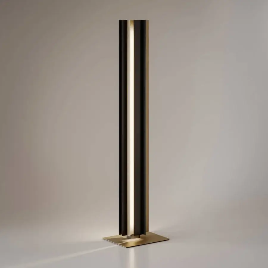 Sophisticated VENICEM Secret floor lamp crafted in light burnished brass and matt black metal with a contemporary directed illumination