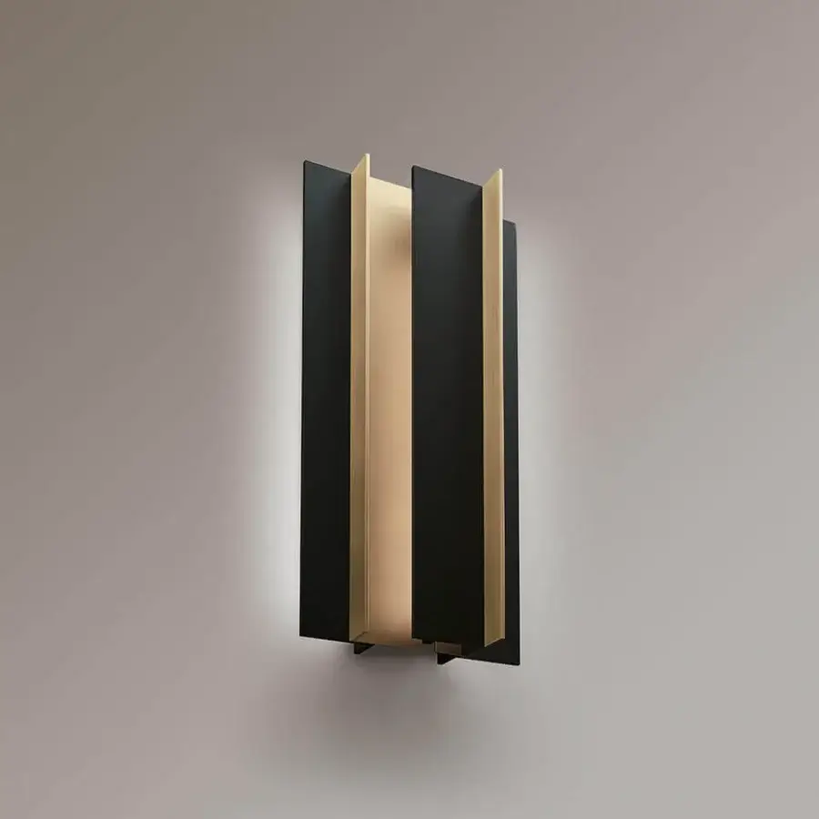 Distinguished VENICEM Secret wall lamp crafted in light burnished brass and matte black metal with an asymmetrical form