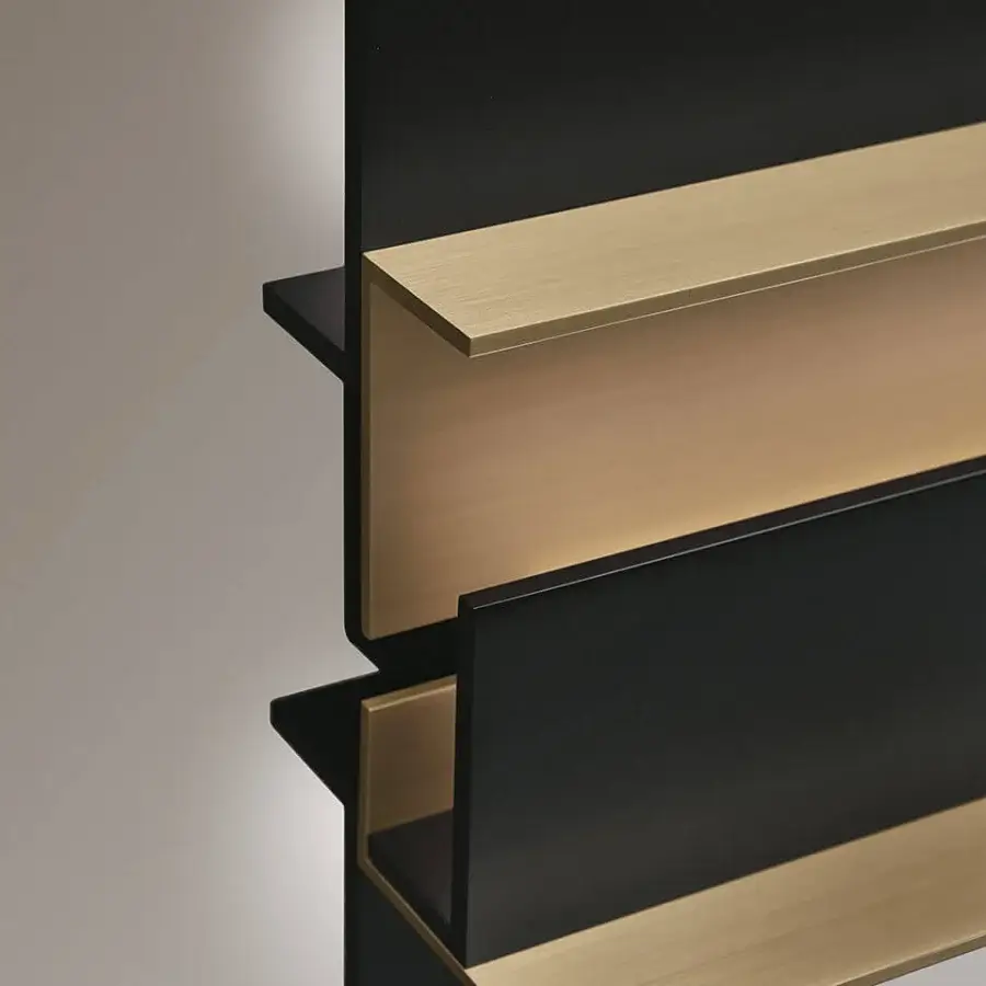 Exclusive VENICEM Secret wall lamp crafted in light burnished brass and matte black metal with a geometric stepped design