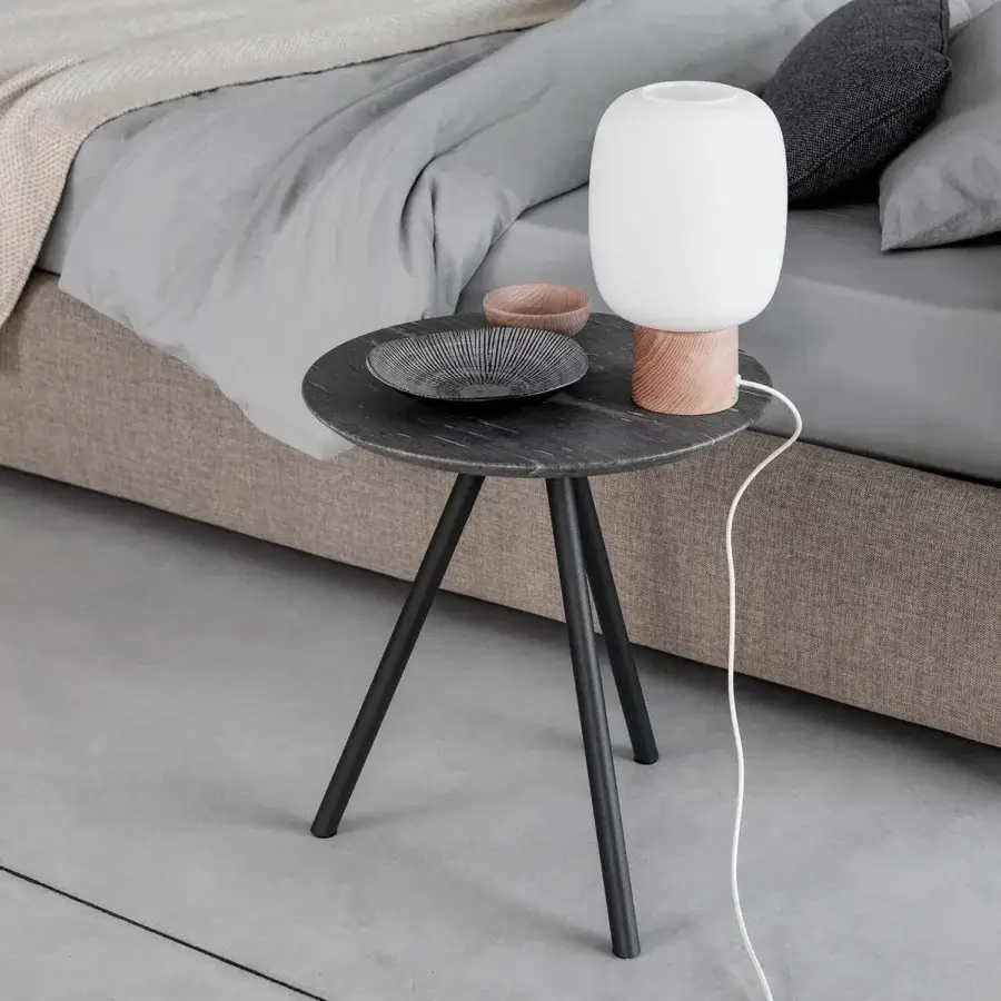 Distinguished Bolzan Letti Jill nightstand with dark gray circular tabletop and slender matte black metal legs in a textured matte finish
