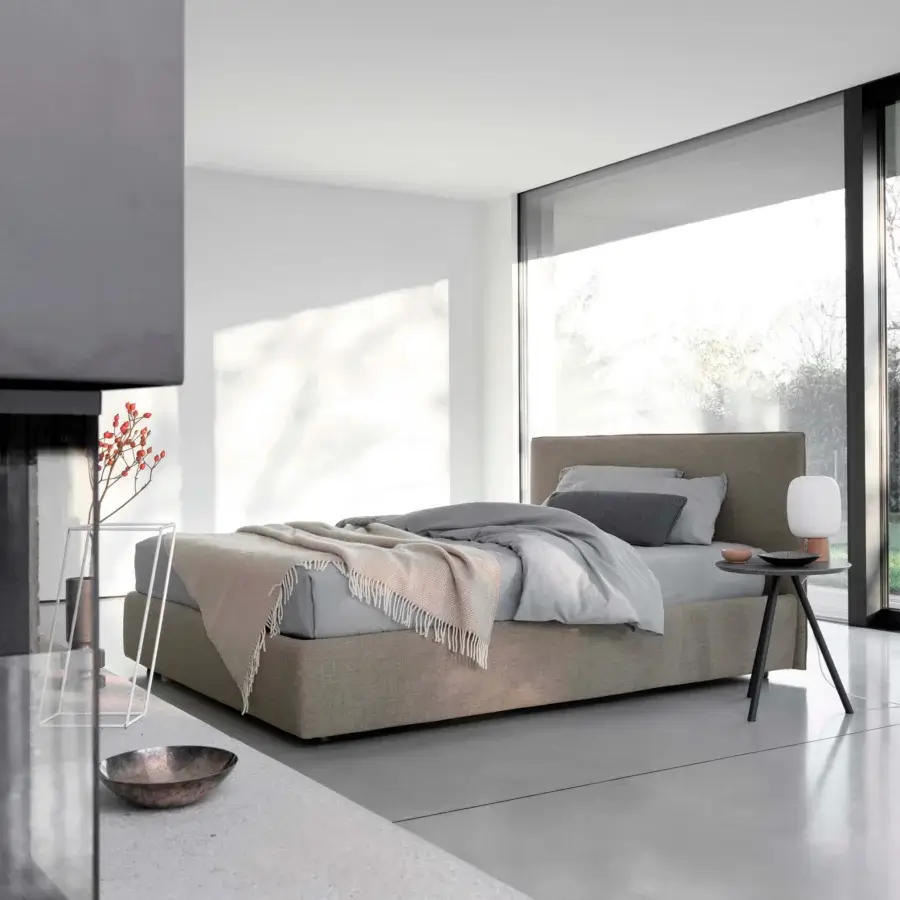 Elegant Bolzan Letti Jill nightstand in matte black metal offers a triangular silhouette and Italian craftsmanship