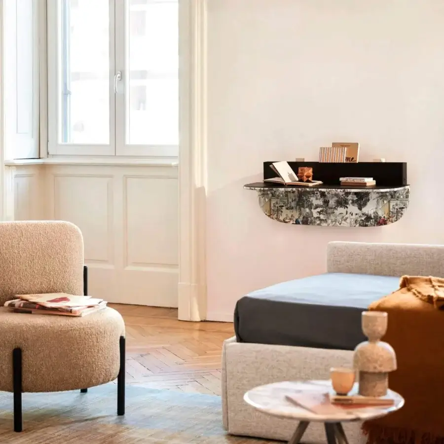 Elegant Bolzan Letti Jill side table with circular grey and beige marble-like tabletop and dark-toned metal legs