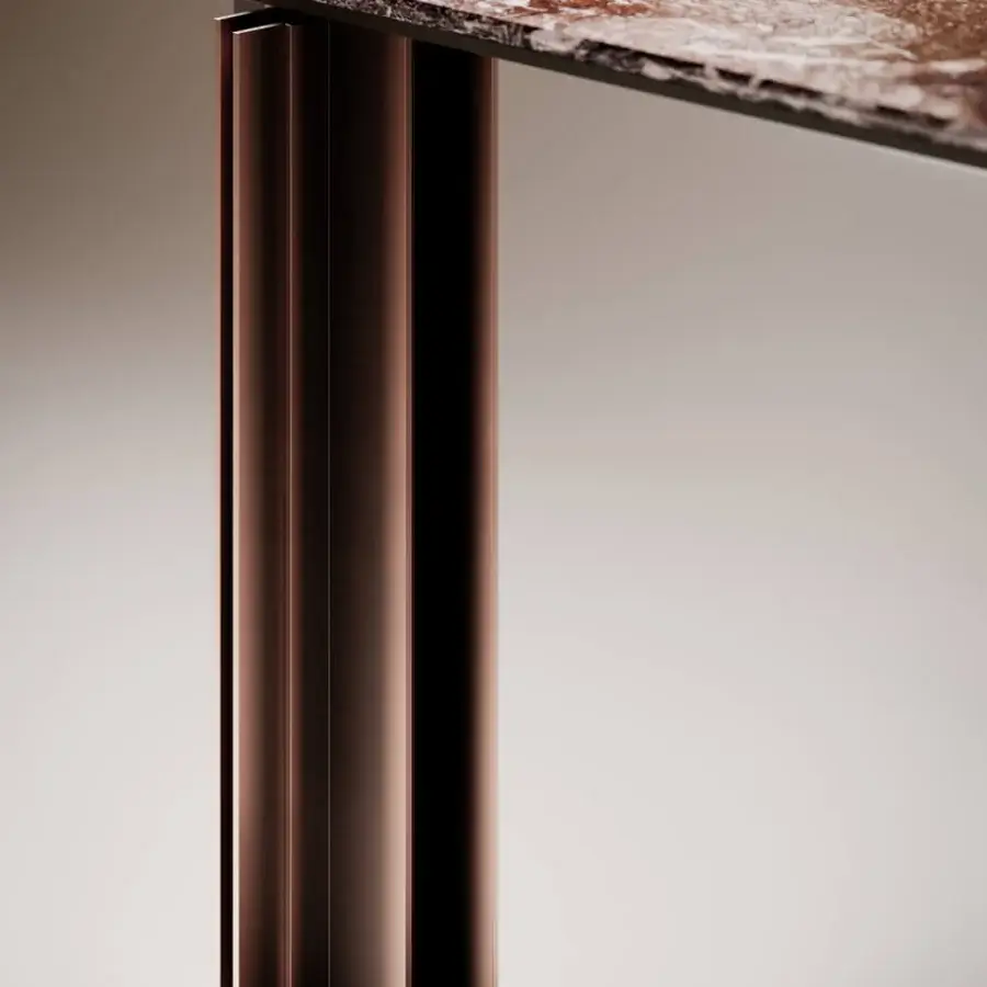Distinguished VENICEM Serge table with round open pore striped travertine marble and dark bronze striped metal legs