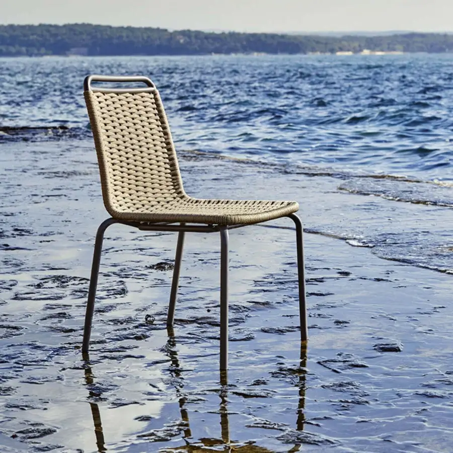 Distinguished Roberti Rattan Portofino chair with durable aluminium, nautic rope woven in a muted beige tone and powder-coated finish