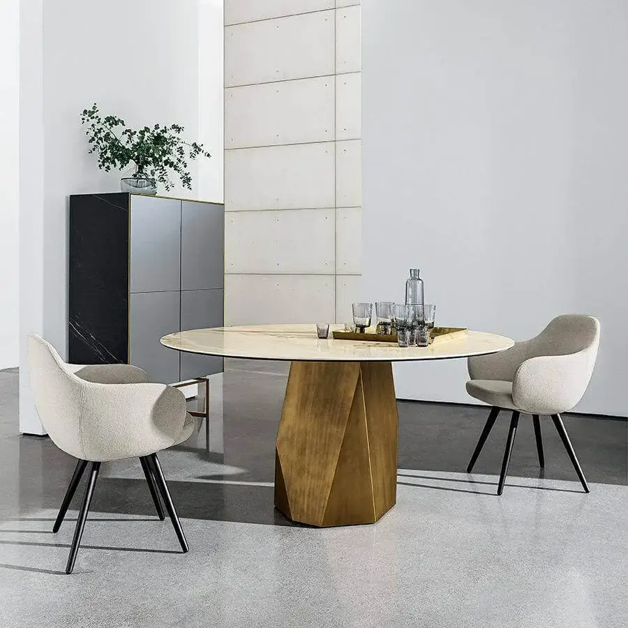 Luxury Sovet Italia Deod round table with light beige liquid glass tabletop and golden-brown satin lacquered metal base