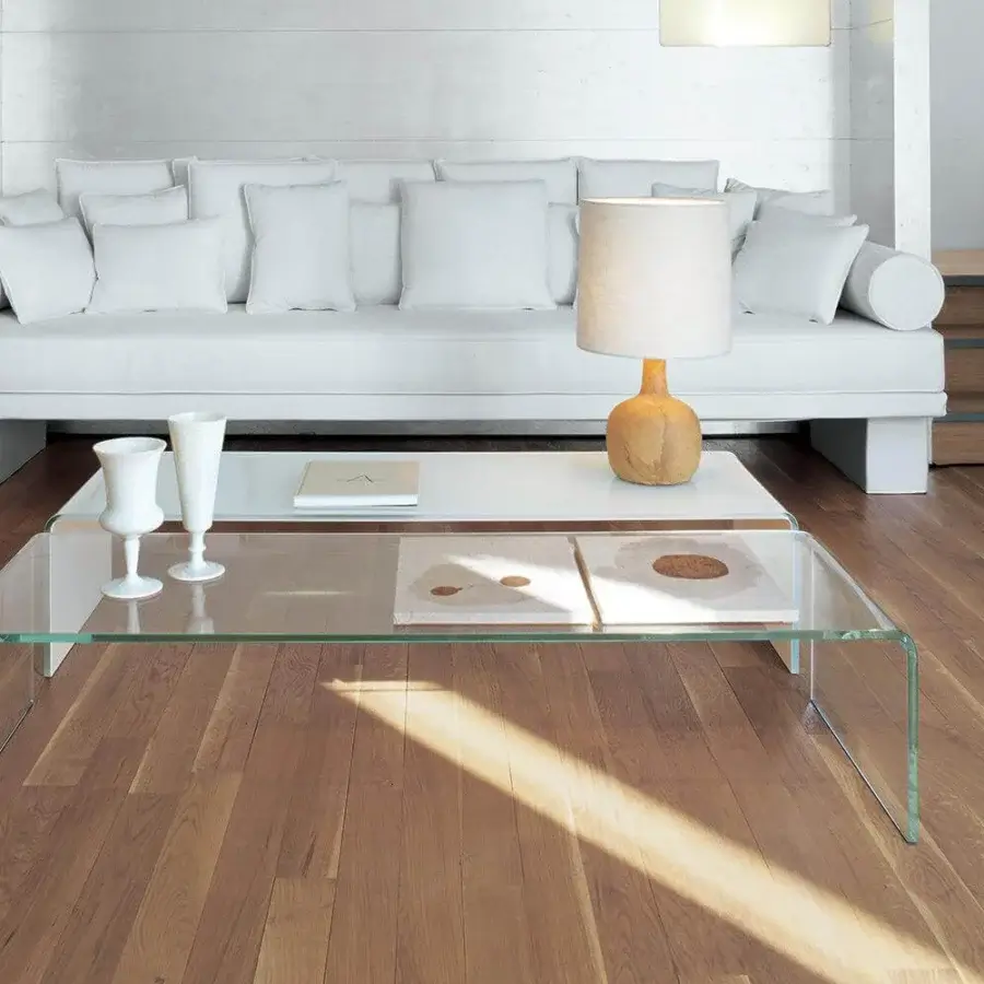 Distinguished Sovet Italia Bridge coffee table crafted in clear glass with a sleek, gently curved transparent surface