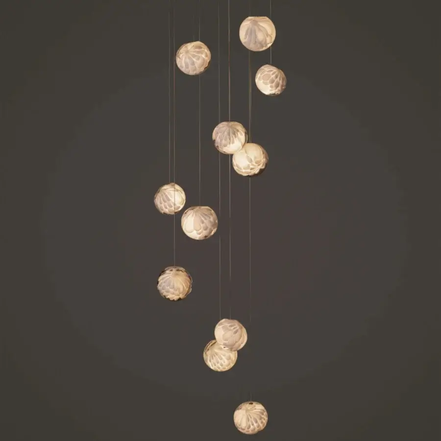 Exceptional Bocci 118 Random Suspension Lamp with eleven hand-blown glass pendants and pale beige petal-like surfaces illuminated within a white canopy