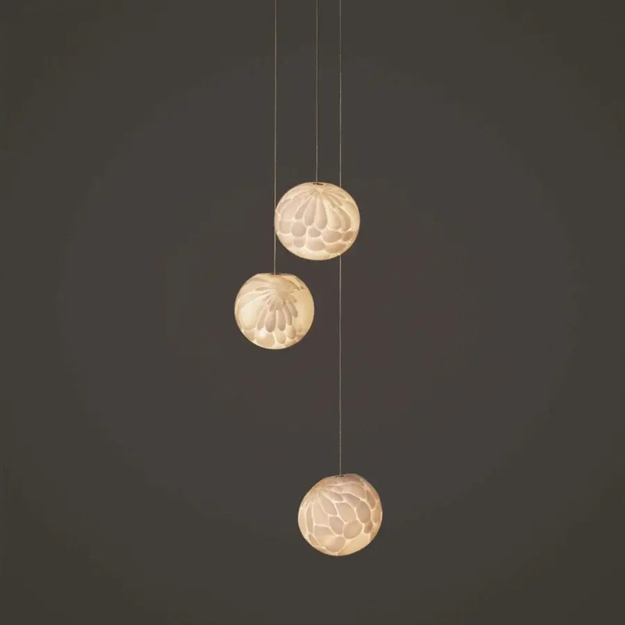Elegant Bocci 118 Random Suspension Lamp with delicate textured glass pendants and thin metallic cords offering a warm off-white glow