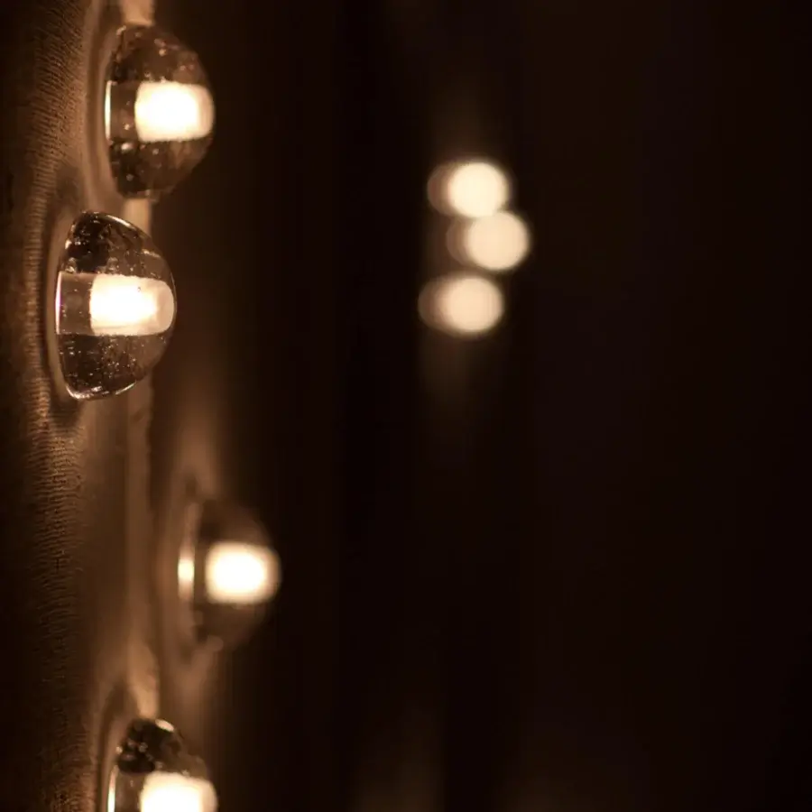 Captivating Bocci 14 Surface Mount wall lamp with cast glass half-sphere and frosted cylindrical void in muted beige tones