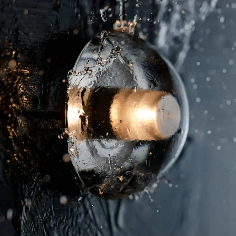 Exclusive Bocci 14 Surface Mount wall lamp with cast glass half-sphere and frosted cylindrical void in gold finish