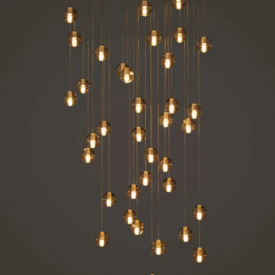 Exceptional Bocci 14 Random Suspension lamp with cascading clear glass shades and satin-finish metal rods