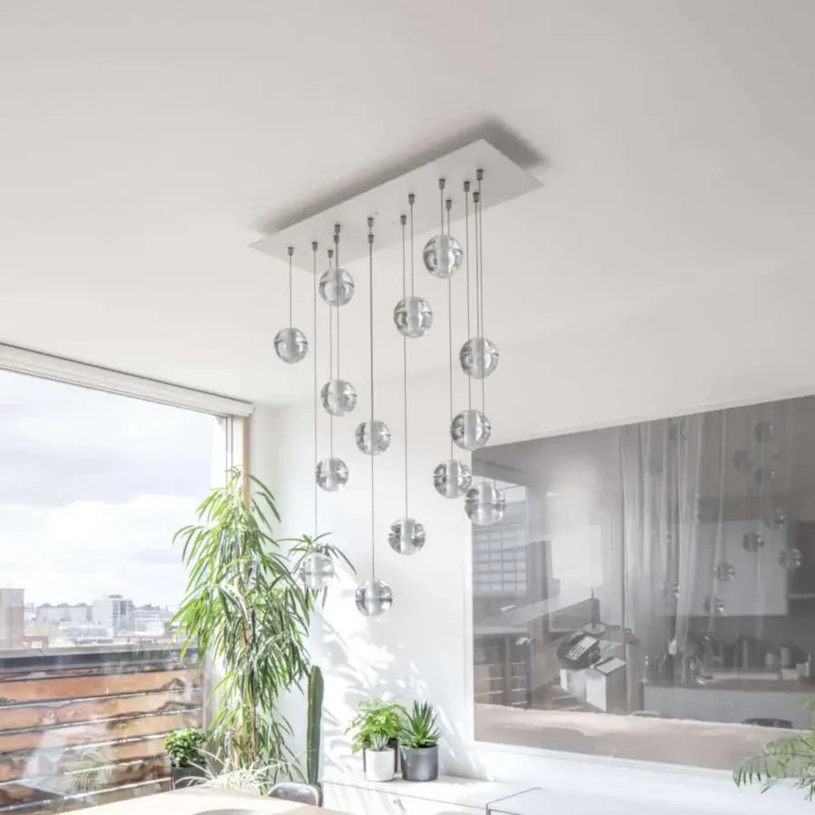 Exceptional Bocci 14 Random Suspension lamp with cascading articulated cast glass spheres and satin silver metal mount