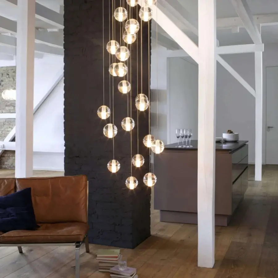 Elegant Bocci 14 Random Suspension lamp with frosted cylindrical voids in articulated cast glass and matte black cable system