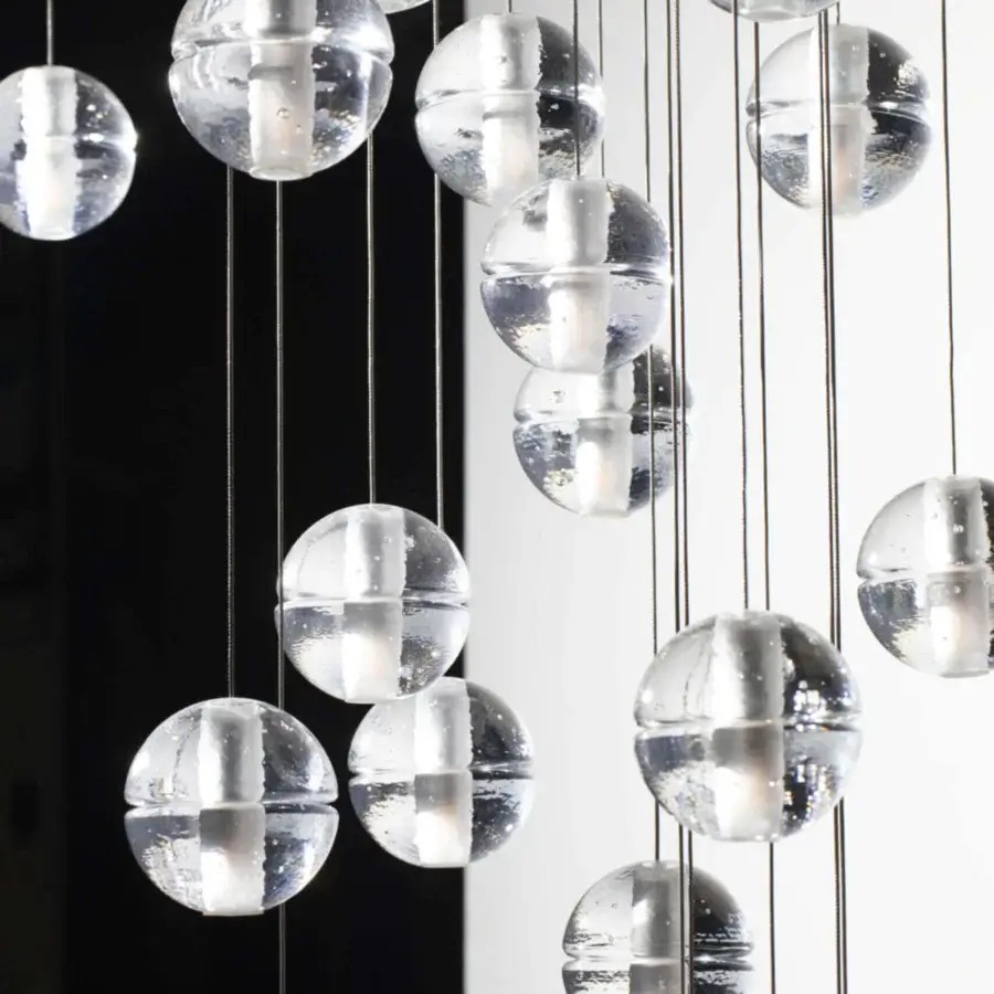 Superior Bocci 14 Random Suspension lamp with articulated cast glass spheres and dark suspension cords in translucent glass
