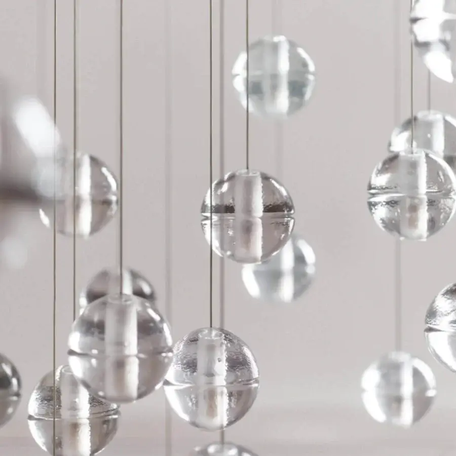 Distinguished Bocci 14 Random Suspension lamp with articulated cast glass spheres in silvery-grey and clear tones crafted with a frosted cylindrical void