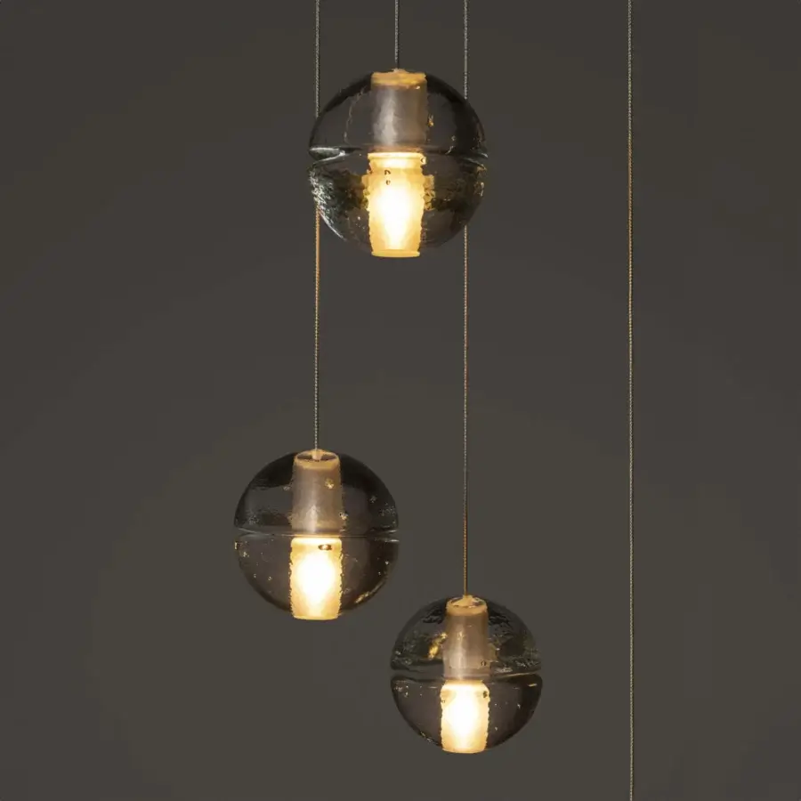 Captivating Bocci 14 Random suspension lamp with articulated cast glass sphere and frosted cylindrical void in translucent tones