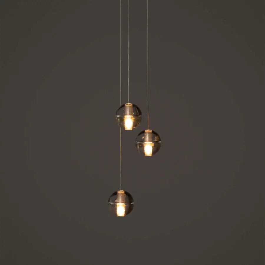 Exclusive Bocci 14 Random suspension lamp with articulated cast glass sphere in translucent amber and frosted cylindrical void