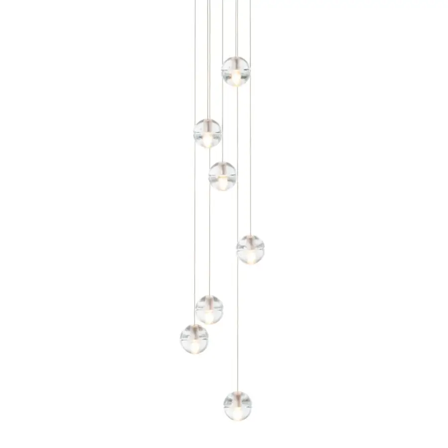 Exclusive Bocci 14 Random suspension lamp with articulated cast glass spheres and frosted cylindrical voids within transparent shades