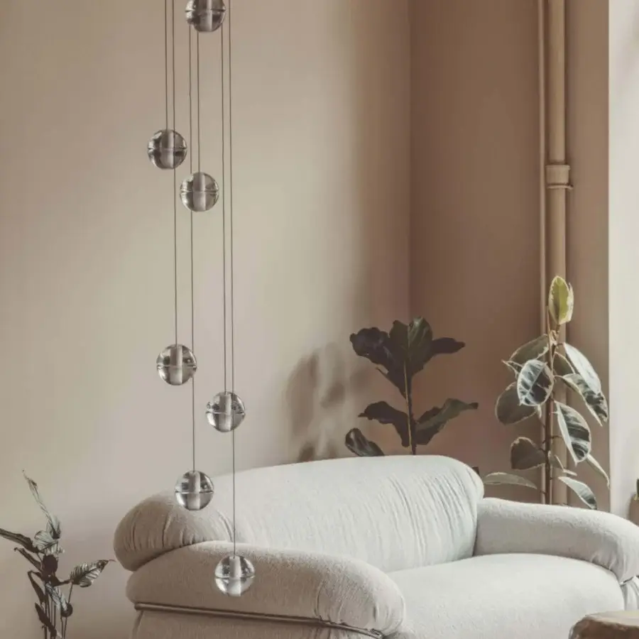 Elegant Bocci 14 Random suspension lamp with articulated cast glass spheres and polished silver finish
