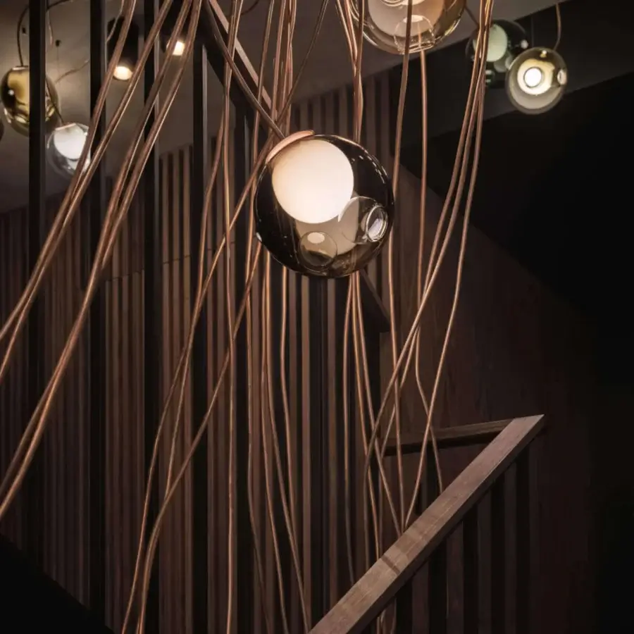 Superior Bocci 28 Copper suspension lamp crafted in clear glass with a milk white interior and natural copper construction
